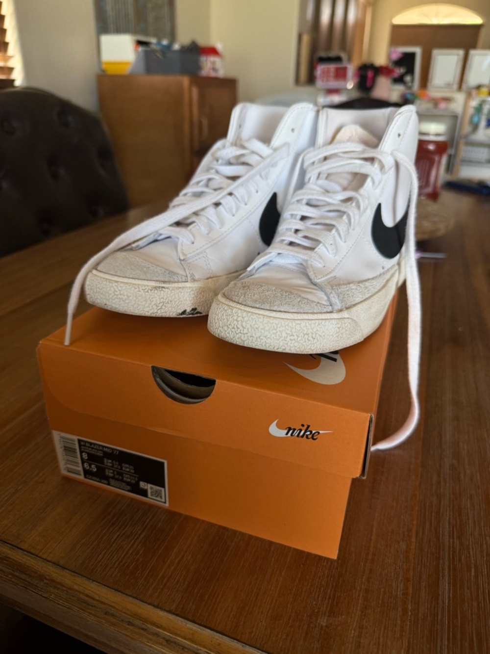 Nike White High-Top Sneakers with Black Swoosh Accent